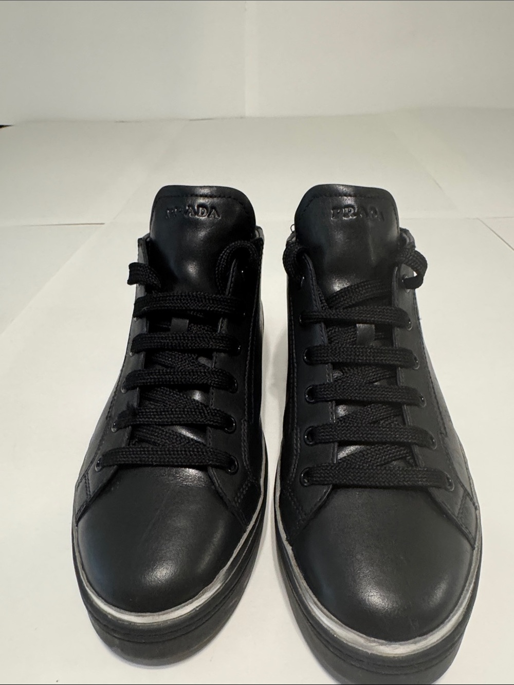 Prada Black Leather Low-Top Sneakers with Subtle Logo